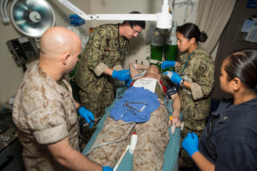 Navy Corpsmen practice saving lives aboard Mesa Verde