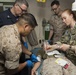 Navy Corpsmen practice saving lives aboard Mesa Verde