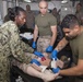 Navy Corpsmen practice saving lives aboard Mesa Verde