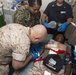 Navy Corpsmen practice saving lives aboard Mesa Verde