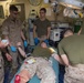 Navy Corpsmen practice saving lives aboard Mesa Verde