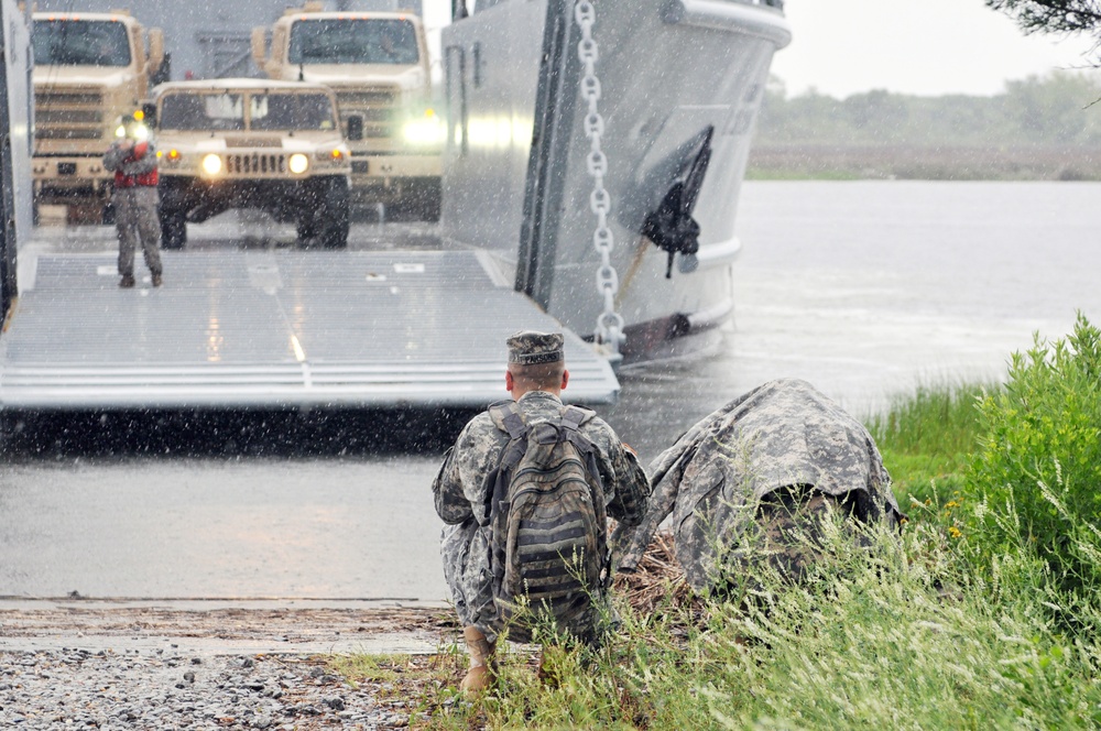 214th MPAD troops work in rain