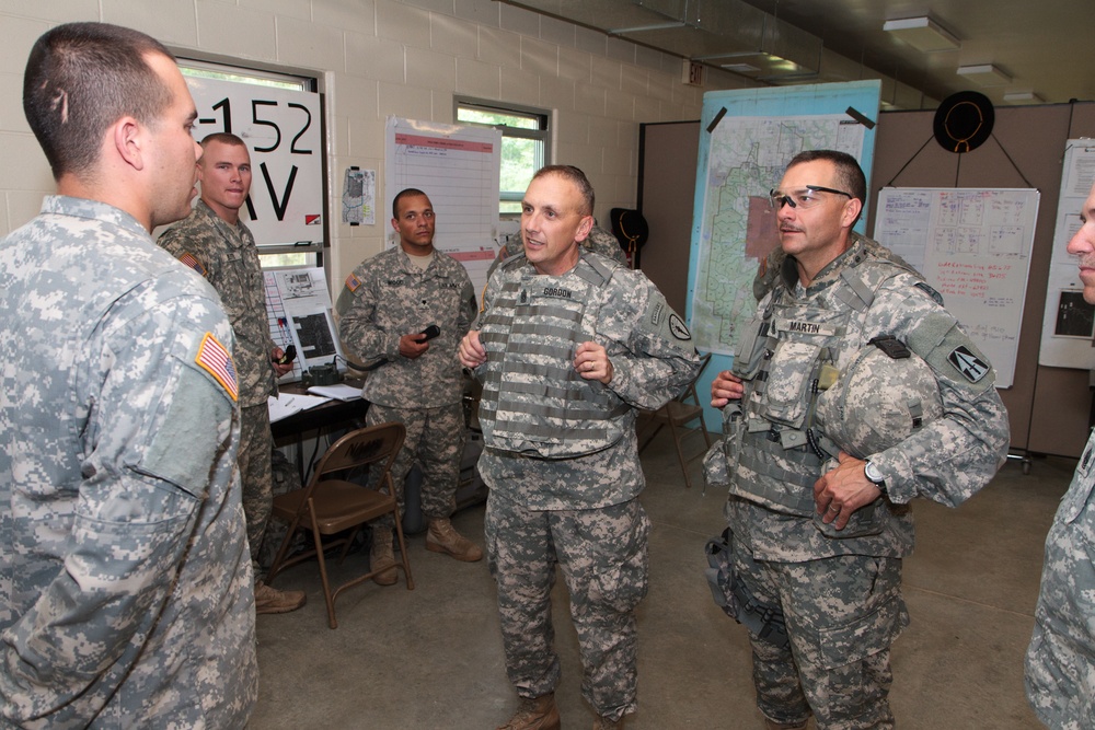 Indiana state adjutant general and state command sergeant major visit 76th IBCT Soldiers during annual training