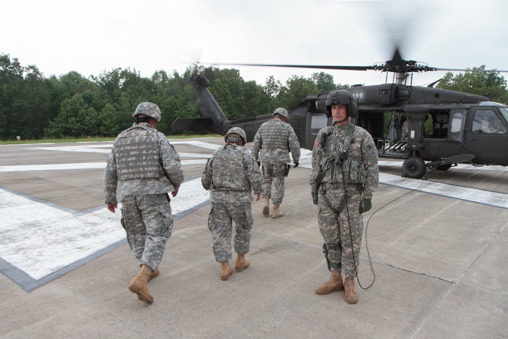 Indiana state adjutant general and state command sergeant major visit 76th IBCT Soldiers during annual training