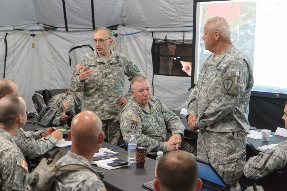 Indiana state adjutant general and state command sergeant major visit 76th IBCT Soldiers during annual training