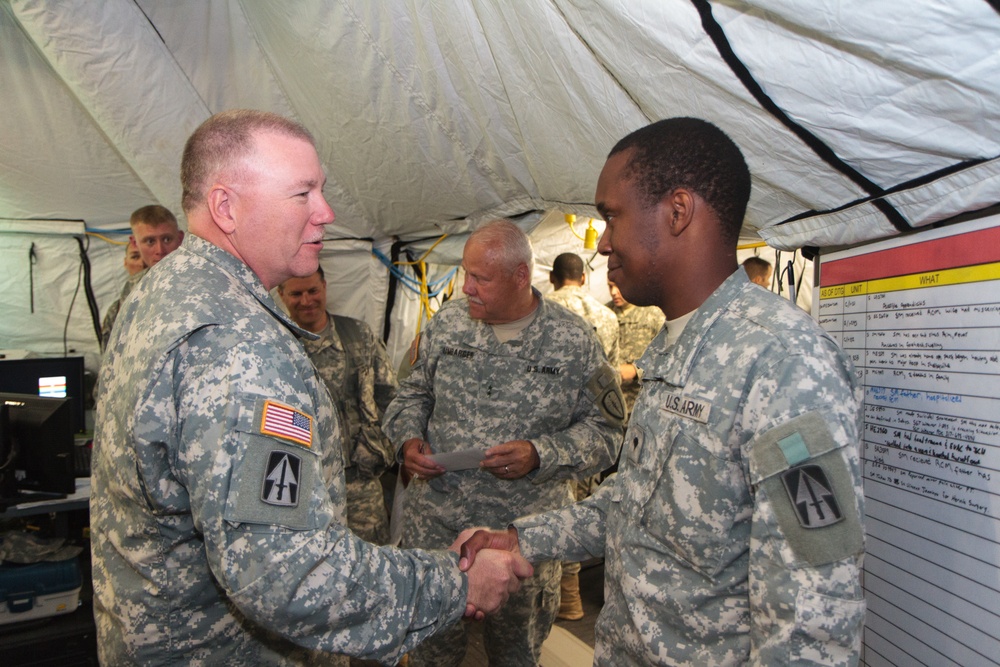 Indiana state adjutant general and state command sergeant major visit 76th IBCT Soldiers during annual training