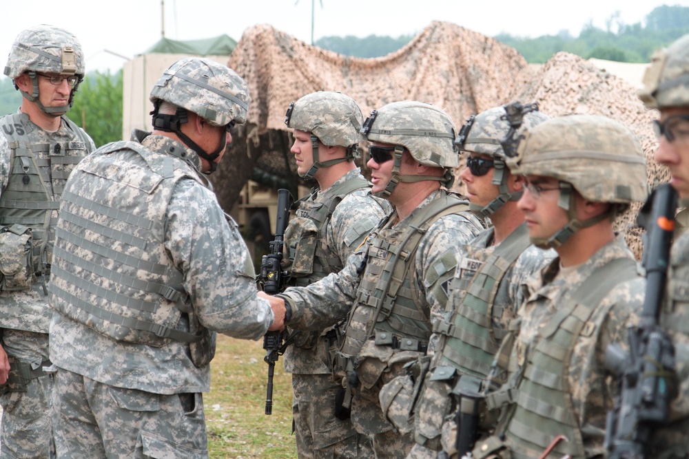 Indiana state adjutant general and state command sergeant major visit 76th IBCT Soldiers during annual training