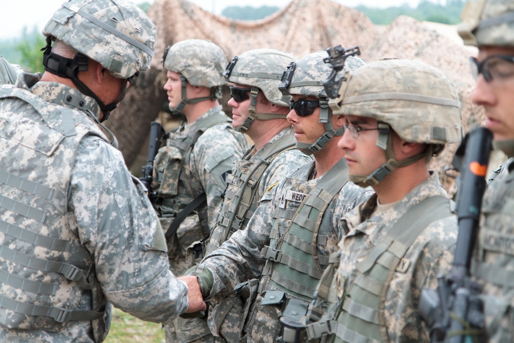 Indiana state adjutant general and state command sergeant major visit 76th IBCT Soldiers during annual training