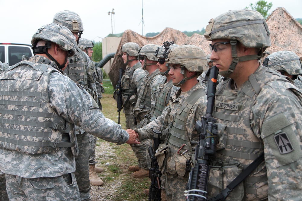 Indiana state adjutant general and state command sergeant major visit 76th IBCT Soldiers during annual training