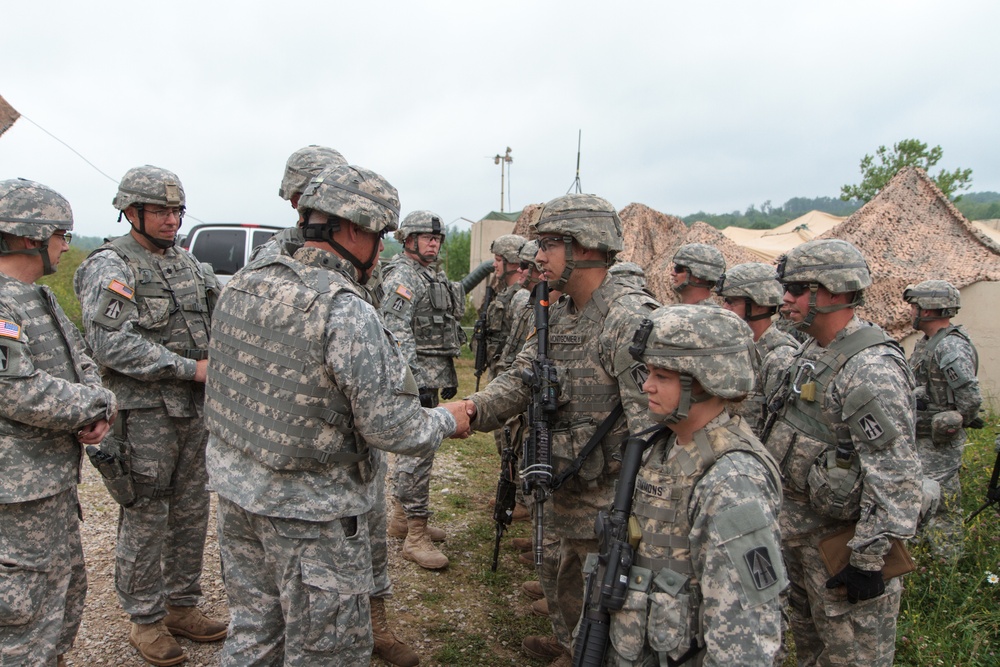 Indiana state adjutant general and state command sergeant major visit 76th IBCT Soldiers during annual training