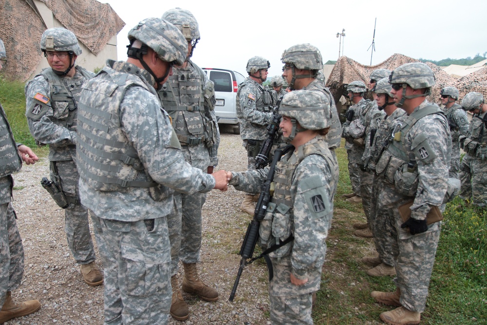 Indiana state adjutant general and state command sergeant major visit 76th IBCT Soldiers during annual training