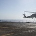 Helicopter inflight refueling exercise with USS Philippine Sea