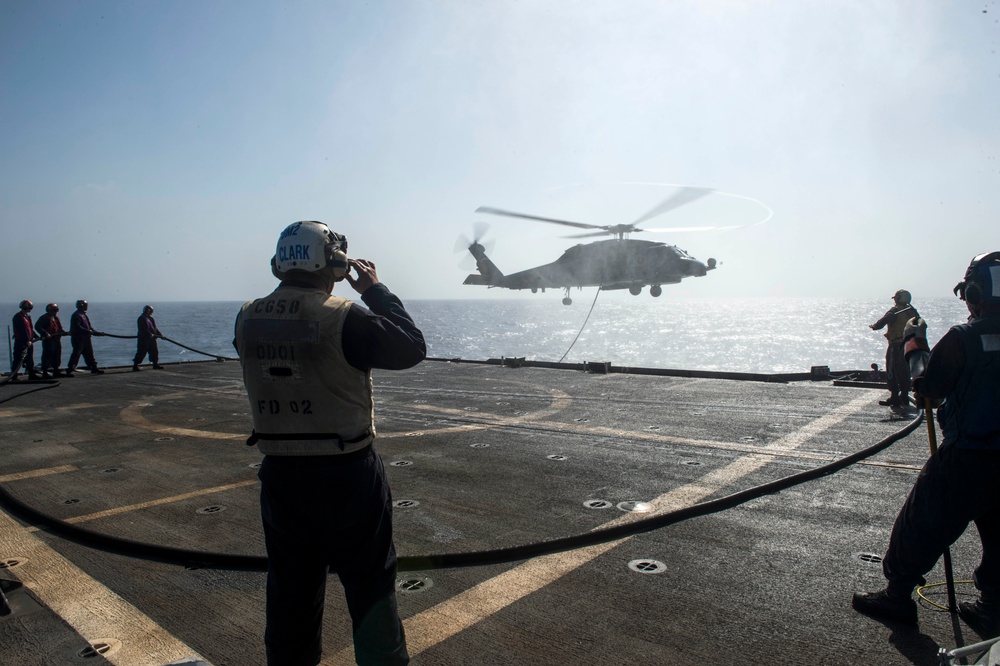 Helicopter inflight refueling exercise with USS Philippine Sea