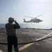 Helicopter inflight refueling exercise with USS Philippine Sea