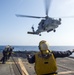 Helicopter inflight refueling exercise with USS Philippine Sea