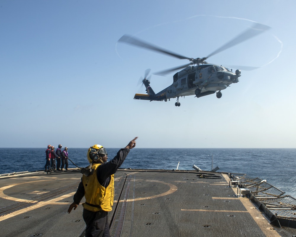 Helicopter inflight refueling exercise with USS Philippine Sea