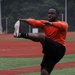 Pfc. Stafford, Army National Guard, Fort Steward, Ga., stretches for the 2014 Warrior Trials