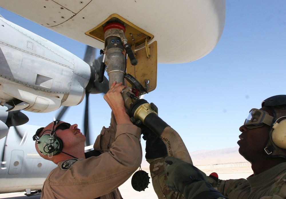 Marine Aircrew with Regional Command (Southwest) supports RC (South) during refueling operation in Afghanistan