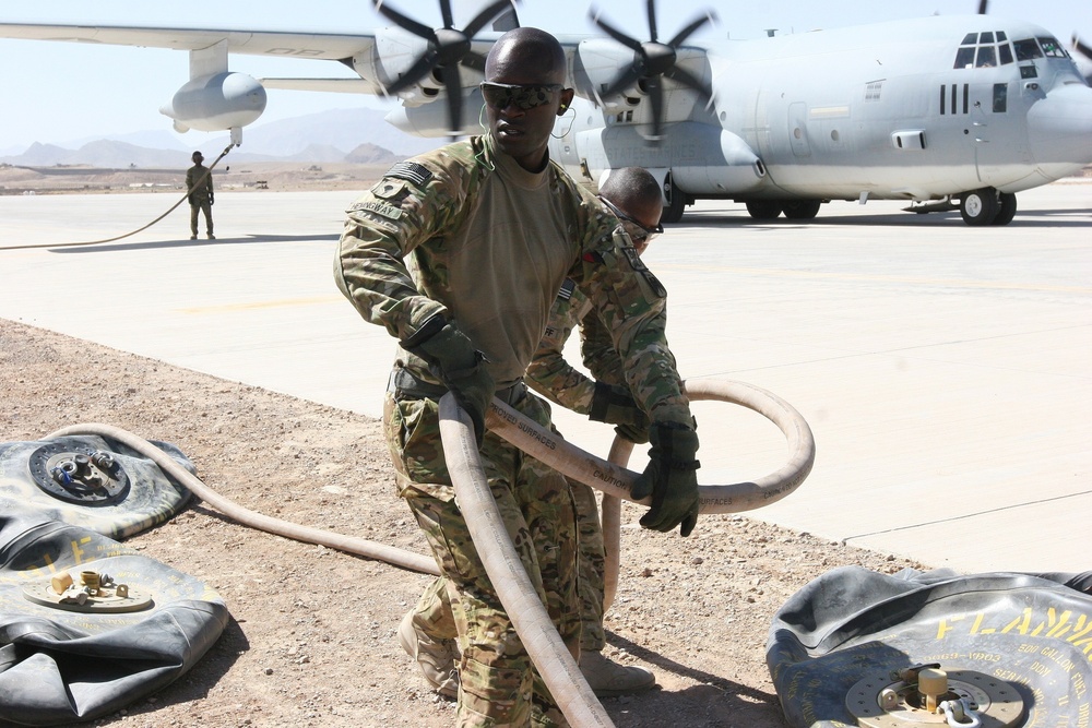 Marine Aircrew with Regional Command (Southwest) supports RC (South) during refueling operation in Afghanistan