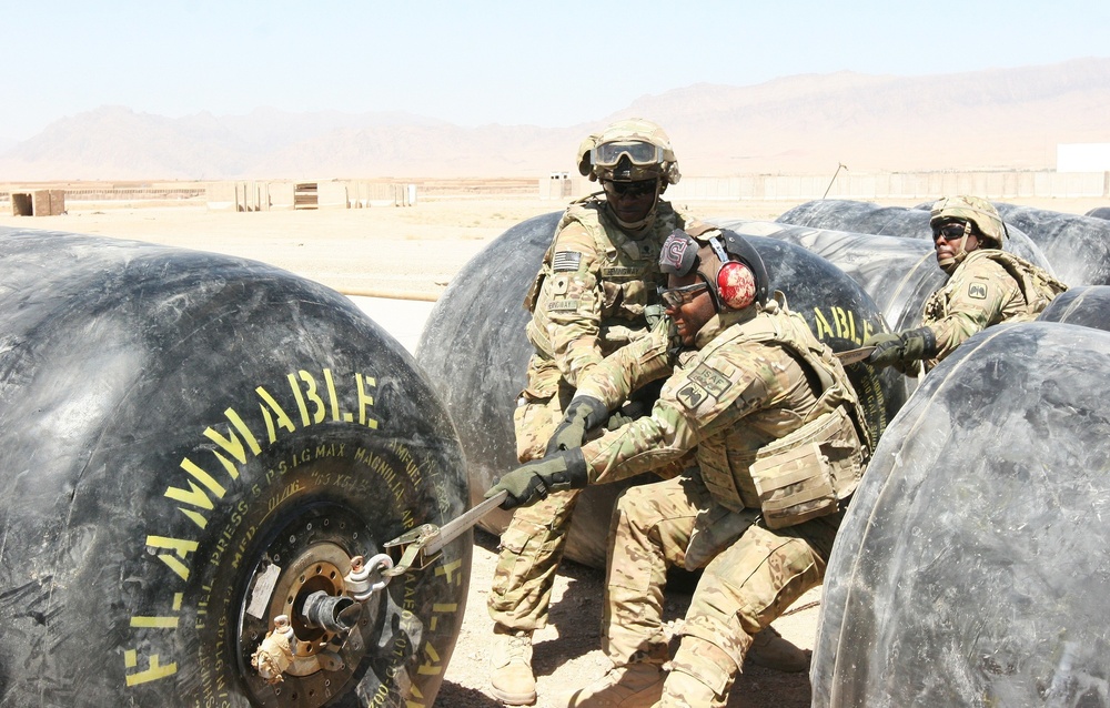 Marine Aircrew with Regional Command (Southwest) supports RC (South) during refueling operation in Afghanistan