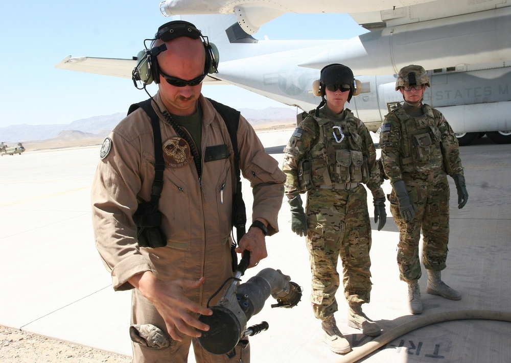 Marine Aircrew with Regional Command (Southwest) supports RC (South) during refueling operation in Afghanistan