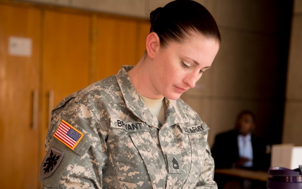 Soldiers work behind the scenes of Saber Strike 14