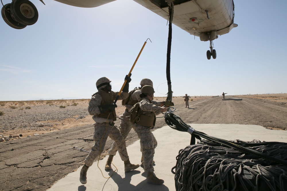 Marines from Combat Logistics Battalion 451, Combat Logistics Regiment 45 simulates a supply drop off and pick up