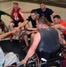 Wheelchair basketball coach fires up his team during training at the 2014 Warrior Trials
