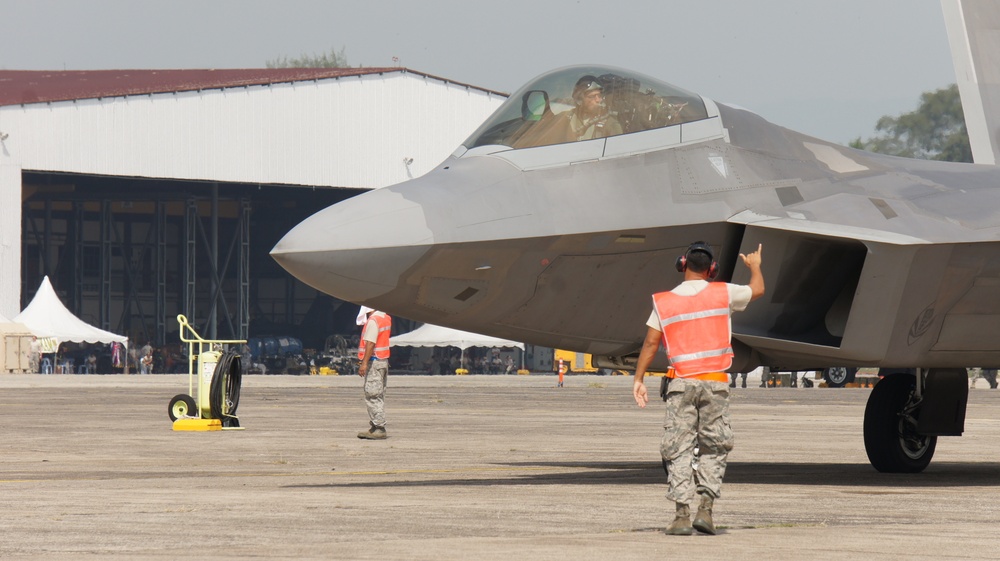 Lt. Gen. Russel J. Handy 11th Air Force commander, tours the activities of Cope Taufan 2014