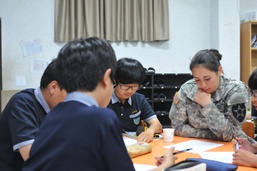 Guns Battalion Soldiers teach English at local schools