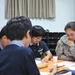 Guns Battalion Soldiers teach English at local schools
