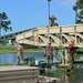 Seabees assemble a medium girder bridge