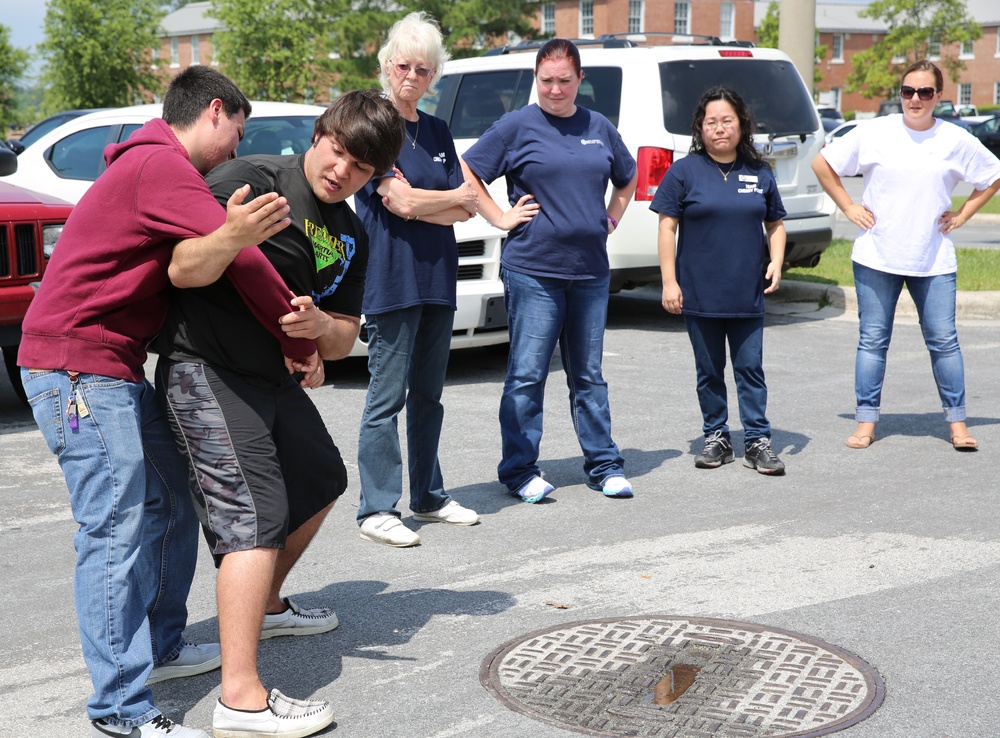 Premier Martial Arts instructs Cherry Point volunteers on basic self-defense