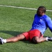 Air Force Staff Sgt. Sanders stretches his leg muscles before competing in the 2014 U.S. Army Warrior Trials