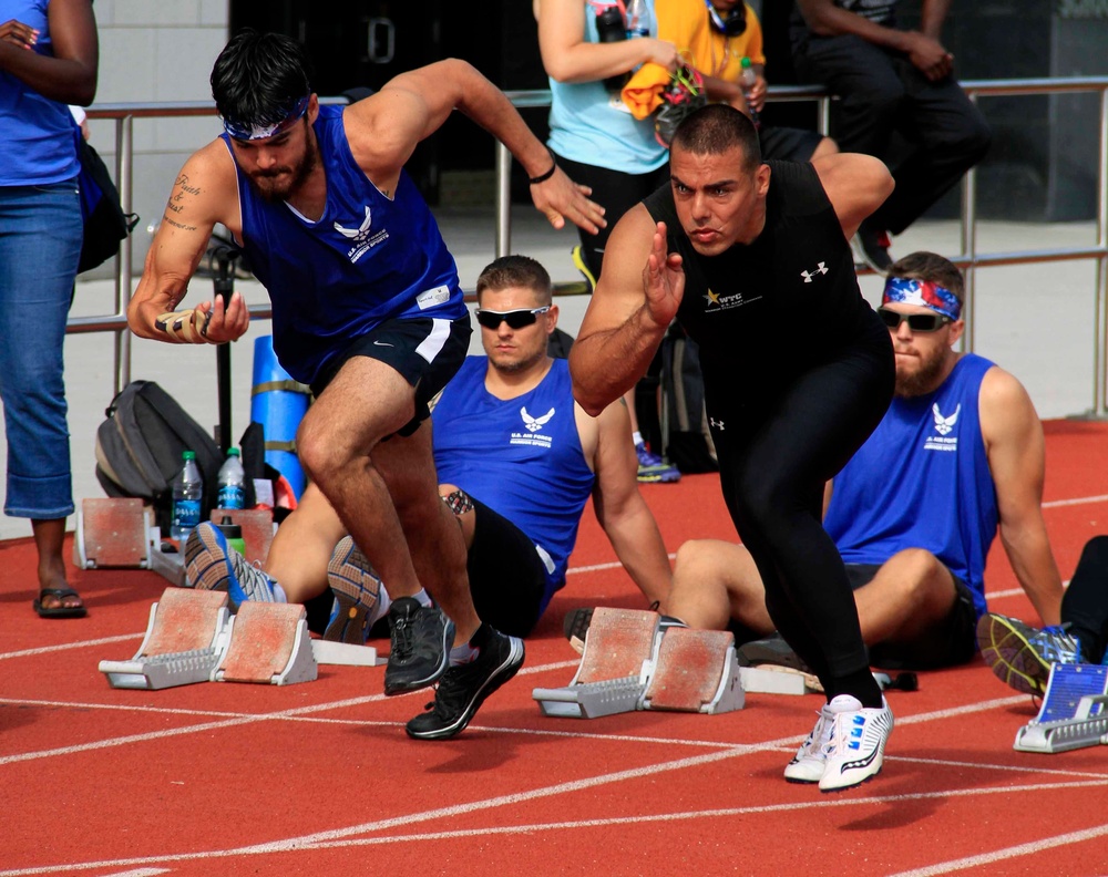 Athletes launch off at the starting line at the 2014 Warrior Trials