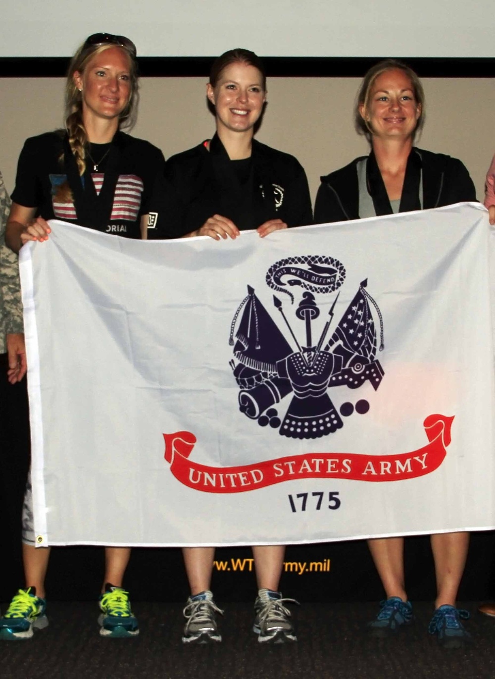Winners of the women's 100 and 200 meter sprint at the 2014 US Army Warrior Trials
