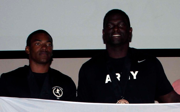 Winners of the men’s 100 meter open sprint at the 2014 U.S. Army Warrior Trials