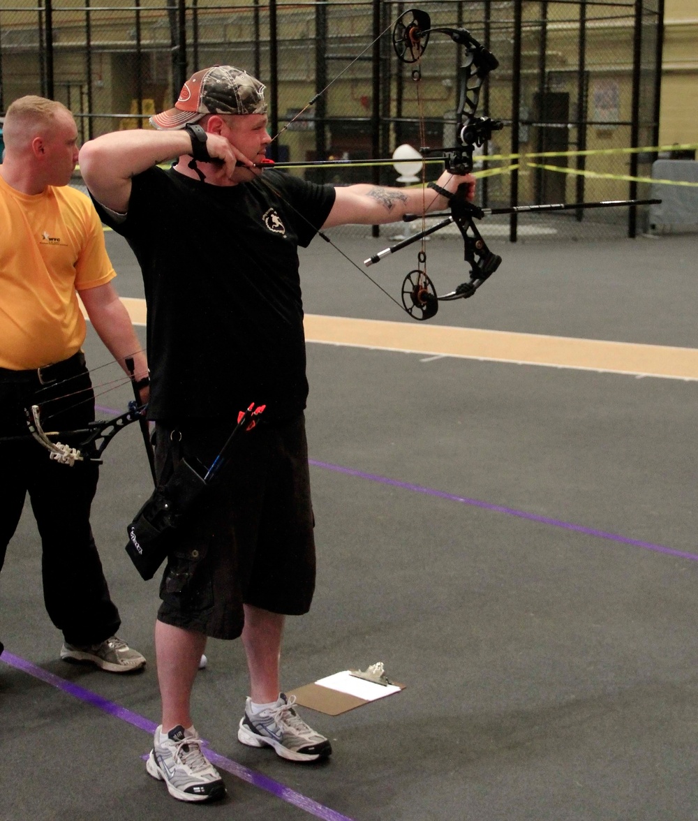 Spc. Harrell competes in archery at the 2014 U.S. Army Warrior Trials