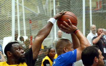 Army and Air Force athletes compete in the wheelchair basketball final game at the 2014 Warrior Trials