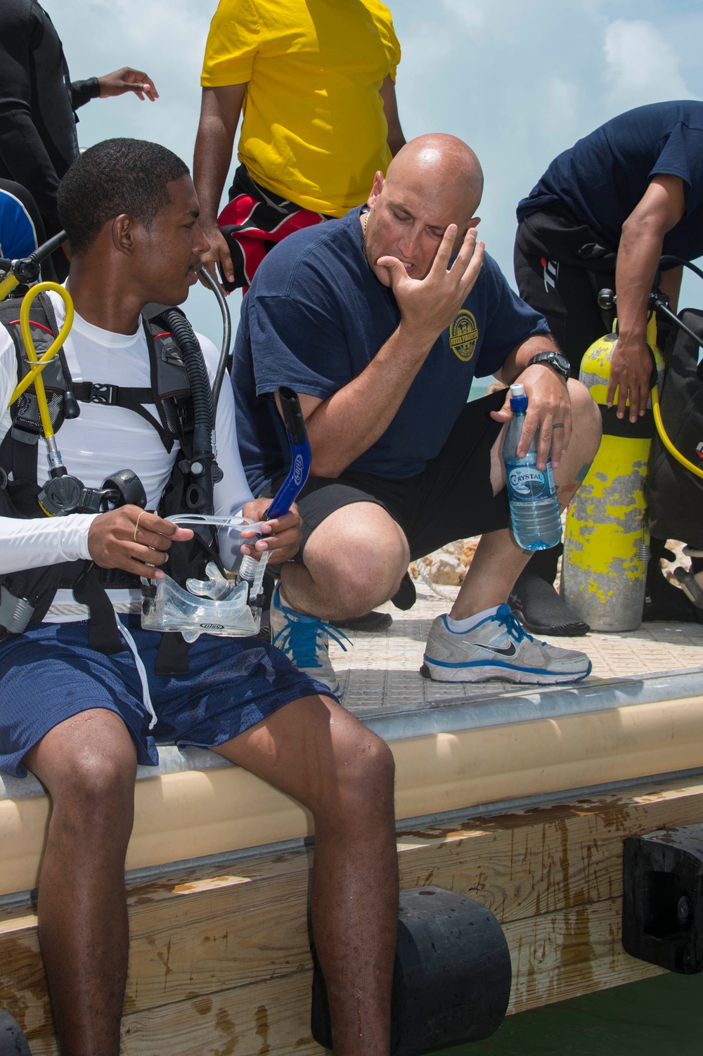 US Navy divers and Belizean Coast Guard divers work together during Southern Partnership Station '14