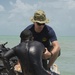 US Navy divers and Belizean Coast Guard divers work together during Southern Partnership Station '14