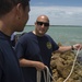 US Navy divers and Belizean Coast Guard divers work together during Southern Partnership Station '14