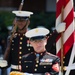 The Commandant of the Marine Corps, Gen. James F. Amos, is scheduled to present the Medal of Honor flag to Cpl. Kyle Carpenter. The ceremony will include a full parade by the President's Own Marine Band and the Commandant's Own Drum and Bugle Corps