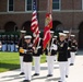 The Commandant of the Marine Corps, Gen. James F. Amos, is scheduled to present the Medal of Honor flag to Cpl. Kyle Carpenter. The ceremony will include a full parade by the President's Own Marine Band and the Commandant's Own Drum and Bugle Corps