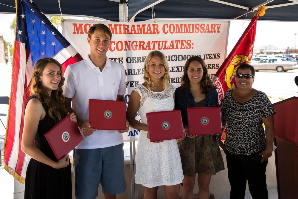 Students receive $2,000 scholarship from commissary