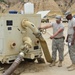 Soldiers from the 288th Quartermaster Detachment from Victoria, Texas, are conducting repairs on a water delivery system