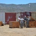 Soldiers unloading containers