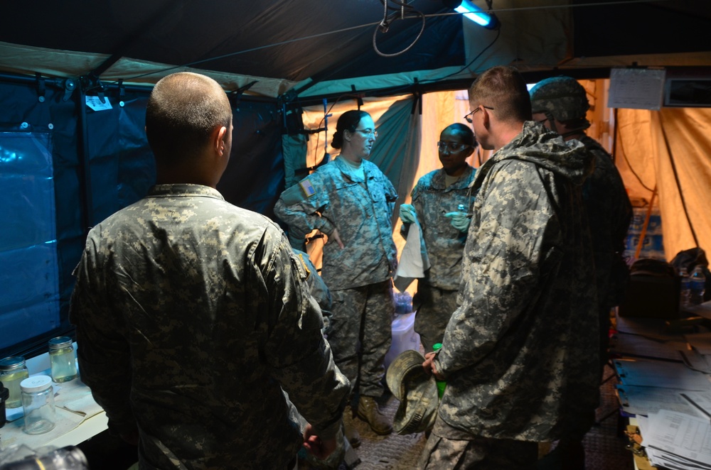 Soldiers from 418th Quartermaster Battalion getting ready to conduct lab testing of fuel samples