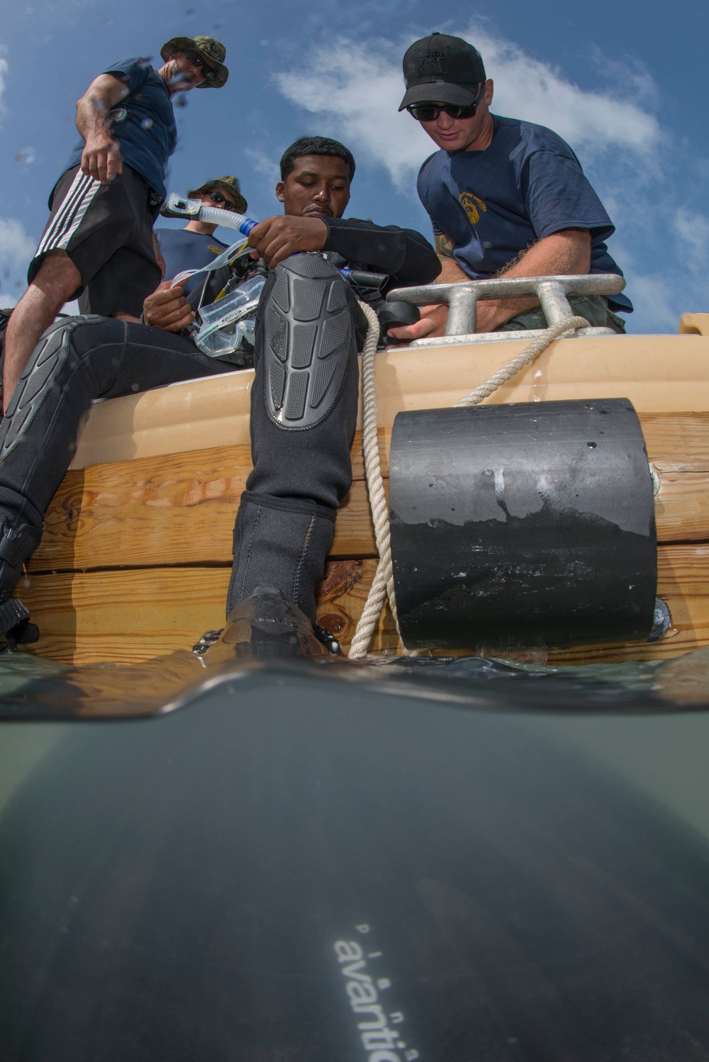 US Navy divers and Belizean Coast Guard divers work together during Southern Partnership Station '14