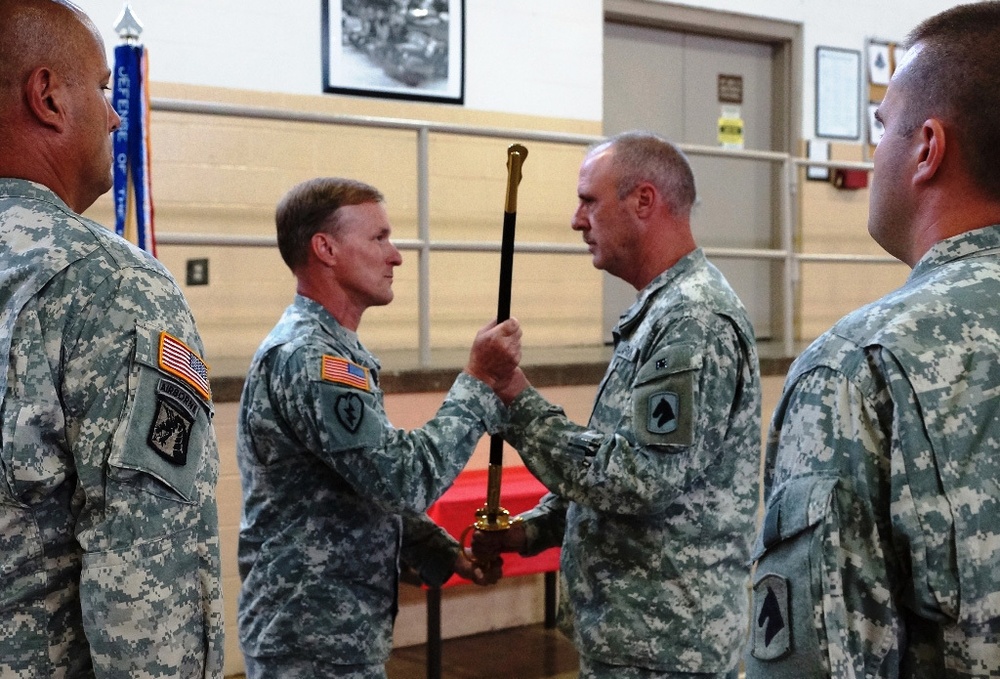 Command Sgt. Maj. Jeffrey McCrystal receives the NCO Sword